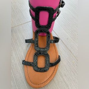 Size 7. NWT black flats.